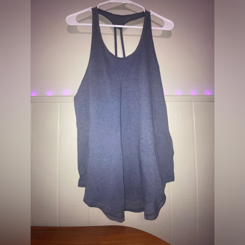 Grey tank top with straps.